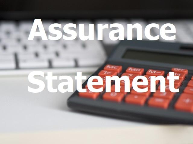 Assurance Statement Pic showing a calculator and keyboard on a desktop